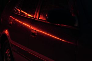 red car with black and red lights